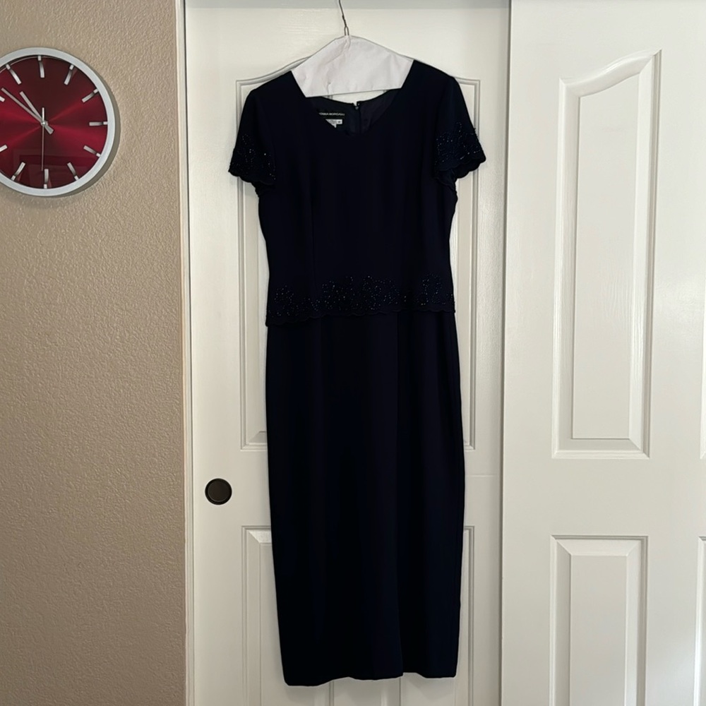 Gorgeous Navy blue beaded fully lined dress “ V” neck, zip back/faux buttons. 14